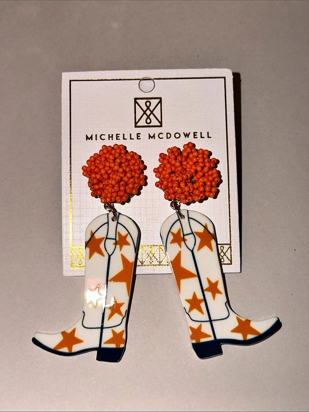 Michelle McDowell Orange Star Cowboy Boot Earrings White & Orange